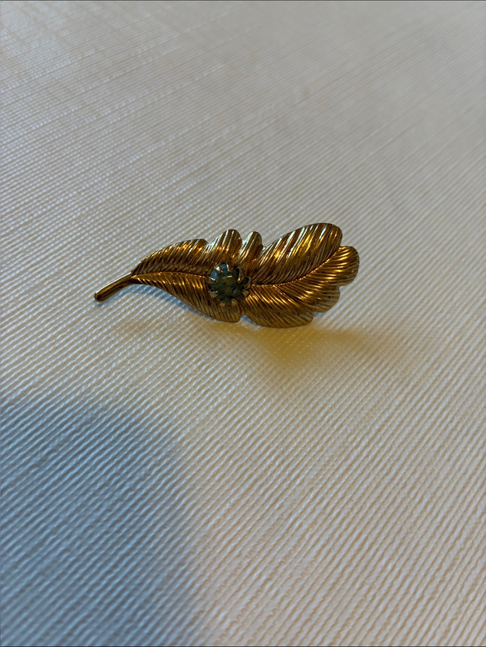 Vintage Gold Feather Brooch with Green Crystal Accent
